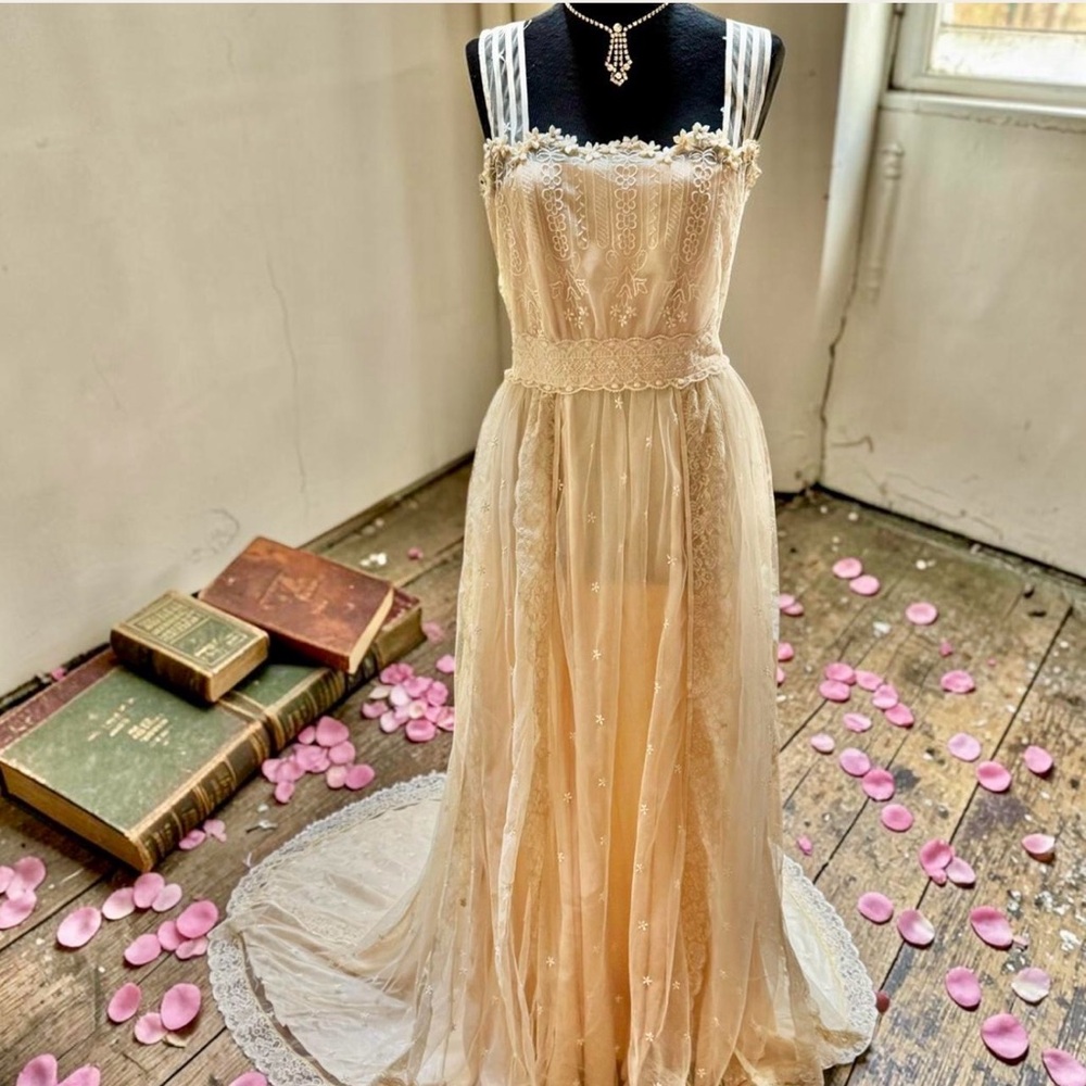 Romantic Cream Lace Bridal Gown with Sheer Overlay